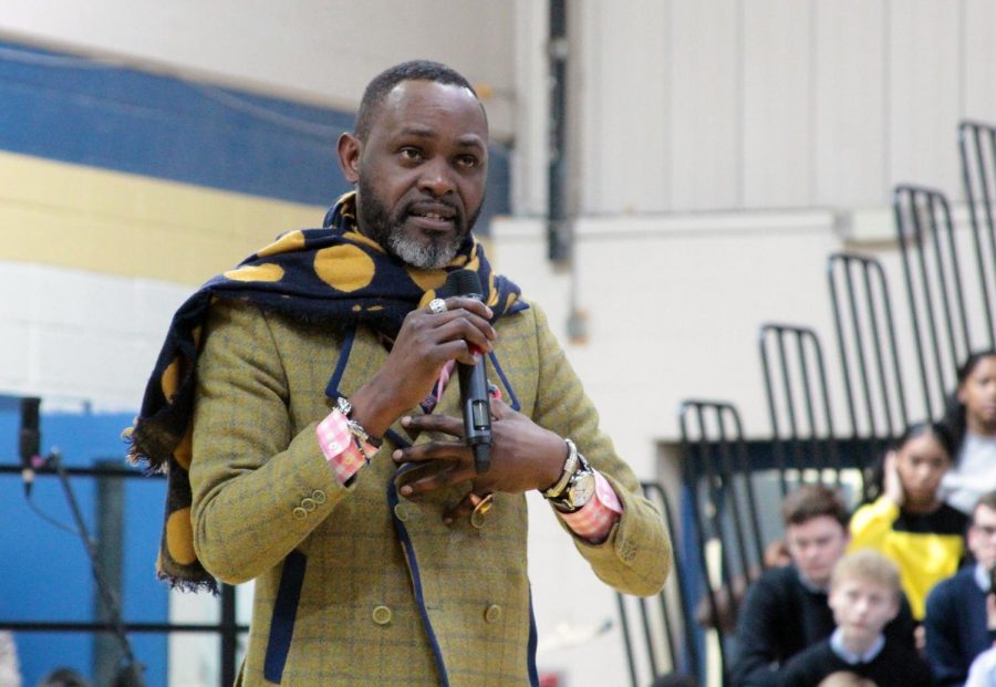 Dr. Derreck Kayongo speaks to students at an all-school assembly celebrating Black History Month.