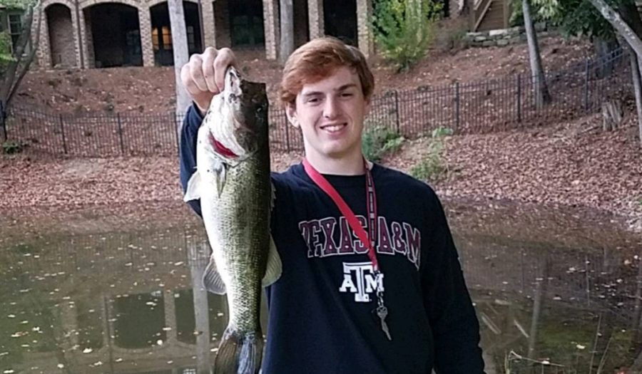 Senior Benji McKey is no stranger to catching fish like this one at his juice spot.