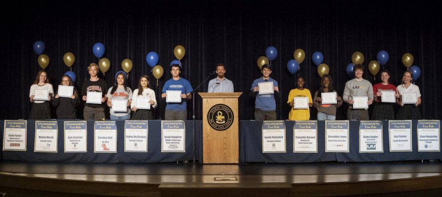 The Fine Arts Program hosted a signing day on May 6 for the 12 seniors who will pursue a fine arts degree in college.