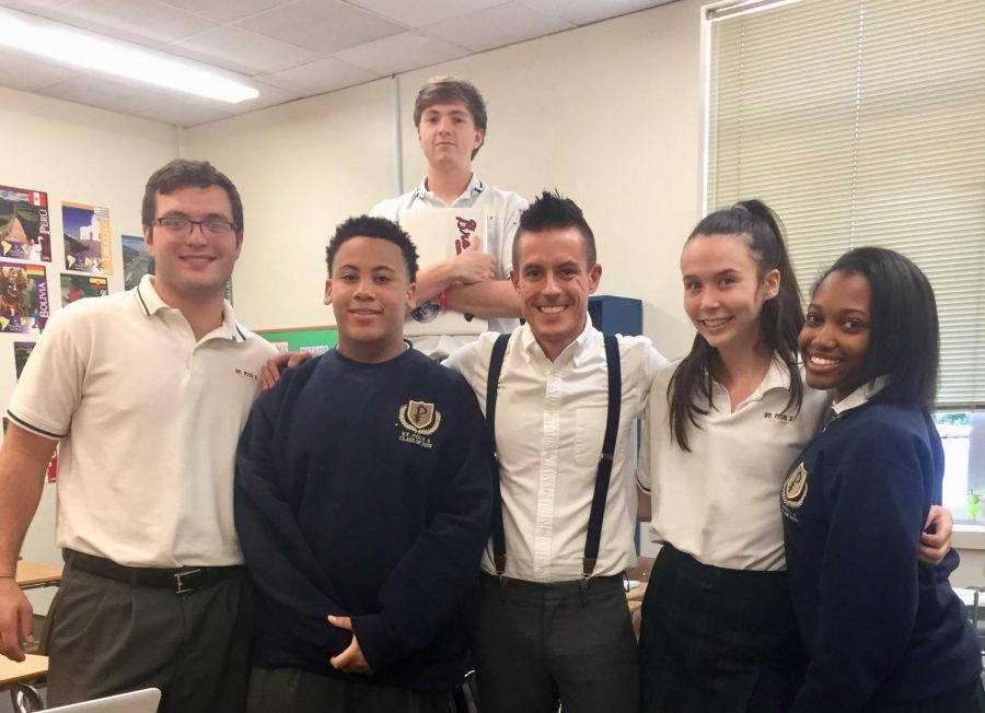 World Languages teacher Mr. Brennan Hamilton takes a picture with seniors from his Spanish IV class (L to R: Vincent  Thomas, Josh Portis, Tommy Fry, Mr. Hamilton, Kayla Carter and Ashley Myles. Mr. Hamilton is one of five new World Languages teachers this school year.