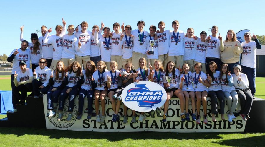 The+cross+country+teams+celebrate+their+state+championship+victories+on+Friday%2C+November+1+in+Carrollton%2C+GA.