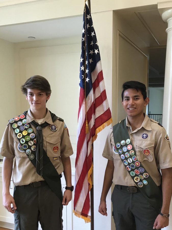 Senior Joe Williams (right) proudly stands next to a friend at their Eagle Scout ceremony last year. Williams is one of several St. Pius students who have earned the Eagle Scout rank, the highest level a scout can achieve.