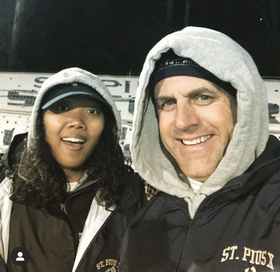 Laschonda Pituk works with head athletic trainer Gary Schmitt on the sidelines of a soccer game earlier this year. Pituk joined the staff in January.