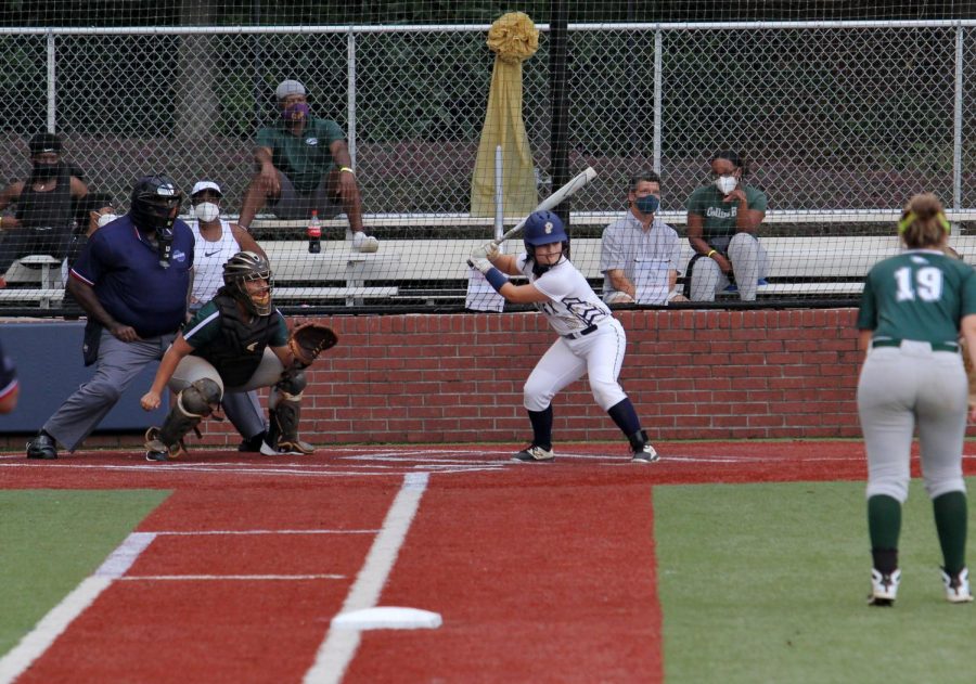 Sophomore Gaby Obregon bats in a game against Collins Hill in August. Softball is one of five fall sports programs that in back action this school year.