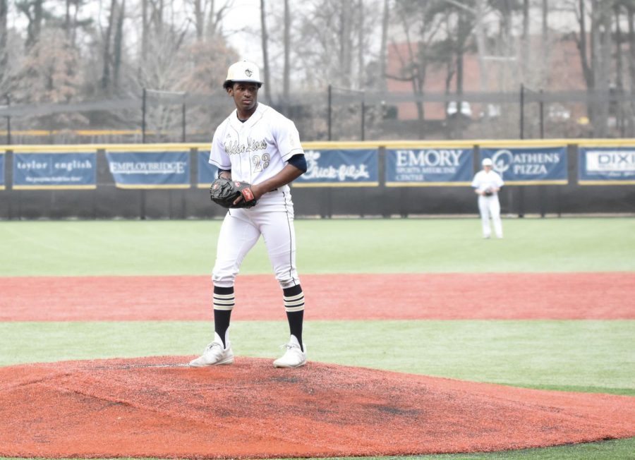 Senior Agyei Quinichett pitches against Arabia Mountain at a home game in February. Quinichett and his teammates face Eastside Wednesday, April 28 in the first round of the state playoffs.