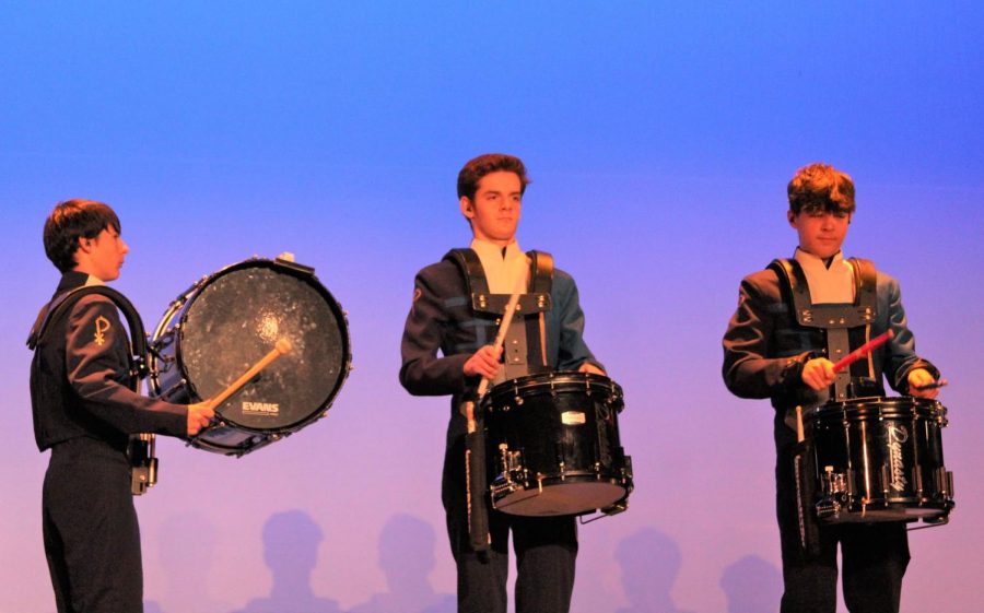 Freshman David Caffrey and sophomore David Kelinrock and Ryan Yelton perform with the percussion ensemble at Morning of the Arts on November 17.