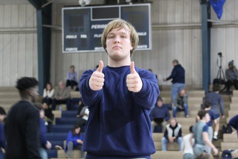 Junior Knox Burton gives two thumbs up before a match in December.