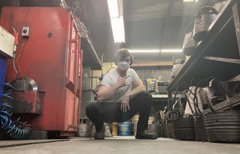 Senior Jude McIntyre works in the garage at Transmissions by Ron.