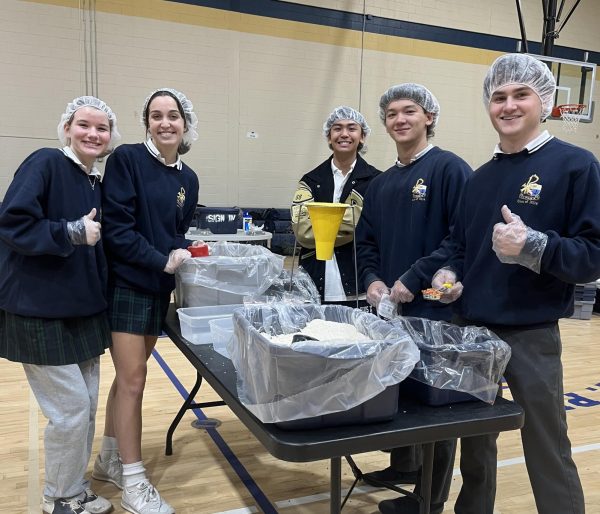 Students participate in Rise Against Hunger service project