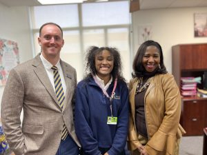 President Aaron Parr and principal Edye Simpson proudly stand next to sophomore Sariah Smith, winner of the Hugh OBrian Youth Leadership Award. The award is voted on by faculty and given to a student who displays excellent character and leadership potential.