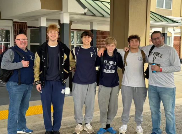Seniors Vincent Casal and Gene Smith, freshman John Soha, and junior Luke Pinson qualified for the state meet in February. Casal and Smith both placed 5th in their respective weight classes. Photo courtesy of Coach Lancaster 