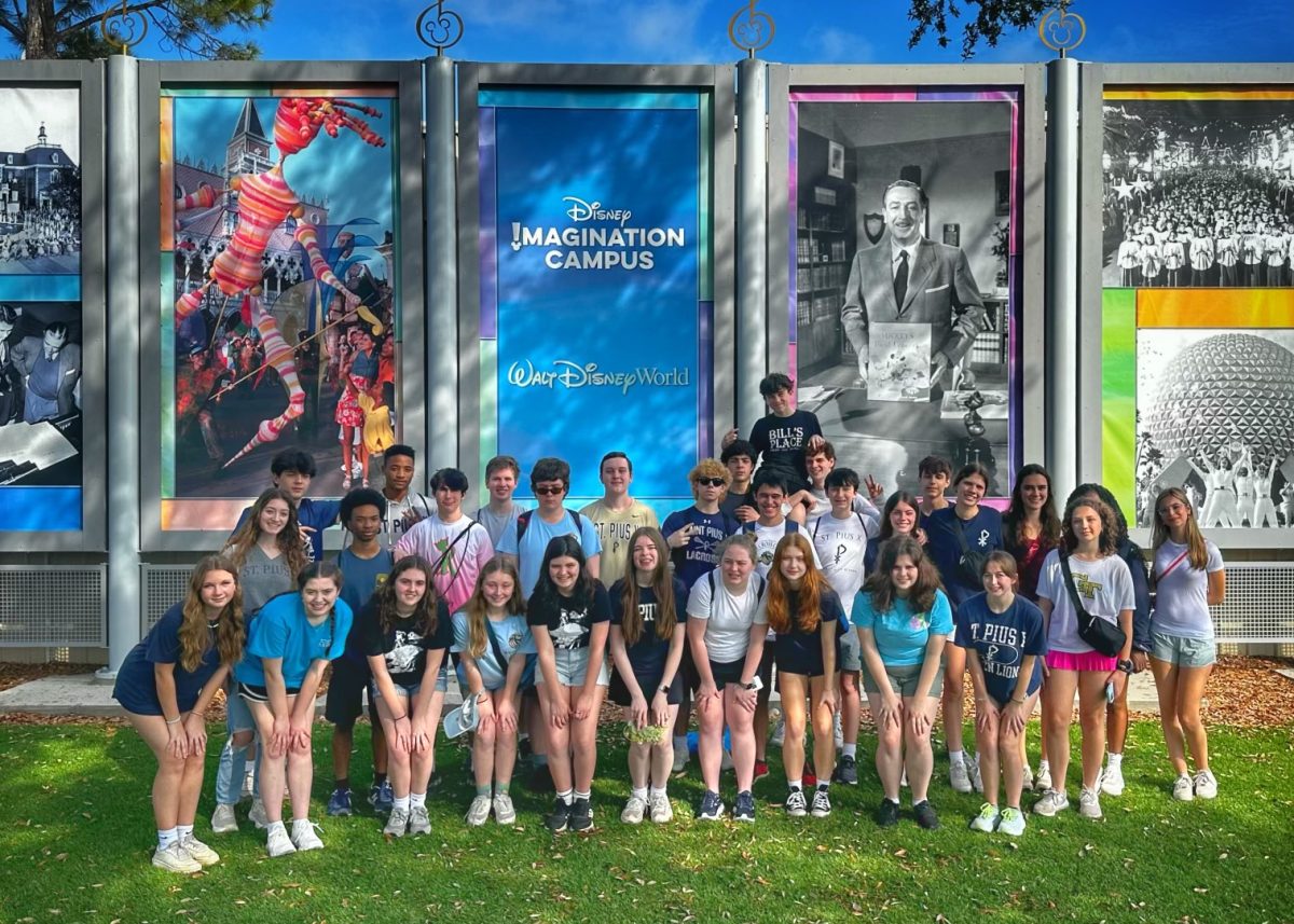 Students+take+a+picture+at+the+Imagination+Campus+near+Epcot%2C+where+they+had+the+chance+to+work+with+a+professional+Disney+musician.