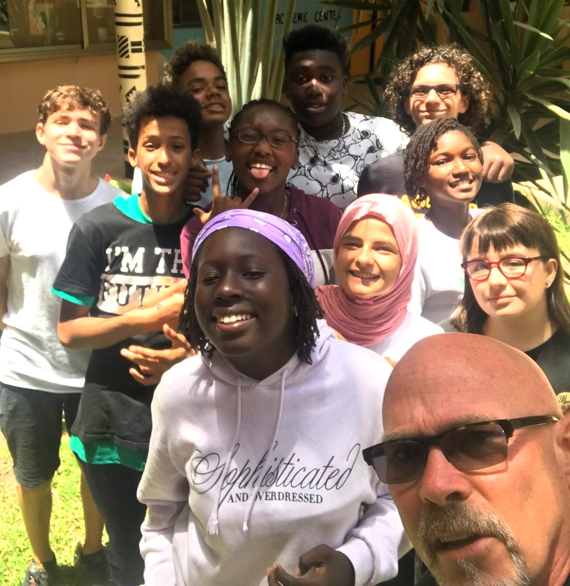 While+teaching+at+the+International+School+of+Dakar+school+in+Senegal%2C+Mr.+Johnson+enjoys+time+outside+with+his+students.+Photo+courtesy+of+Mr.+Johnson