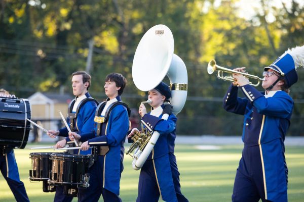 The marching band performs before Senior Night in October.