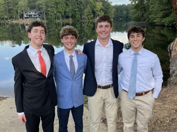 Senior Class Presidents Charlie Hildreth (far left) and Patrick Davey (far right) take a picture with Student Council Presidents Colin Crosby and Charlie Nelson before Homecoming.