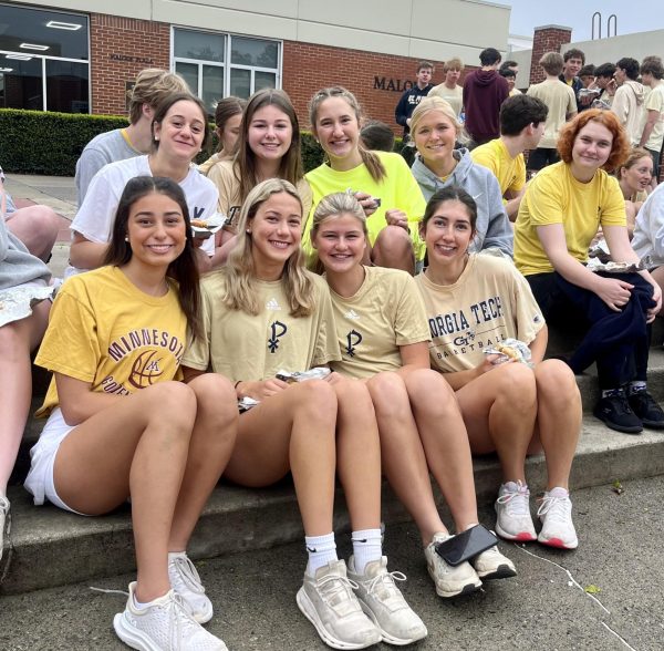 Juniors at last year's field day enjoy Teacher Jam in the courtyard, 1 of 4 rotations students go to throughout the day.
