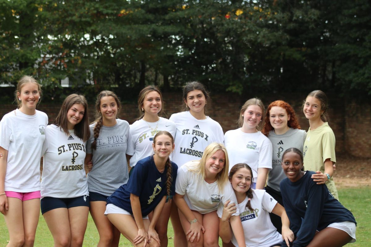 A group of girls take a photo outside at the Sophomore Revival.