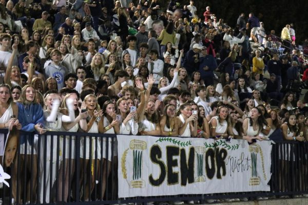 The Jungle cheers on the football team during senior night in October. Photo courtesy of Maggie Maloney '26.