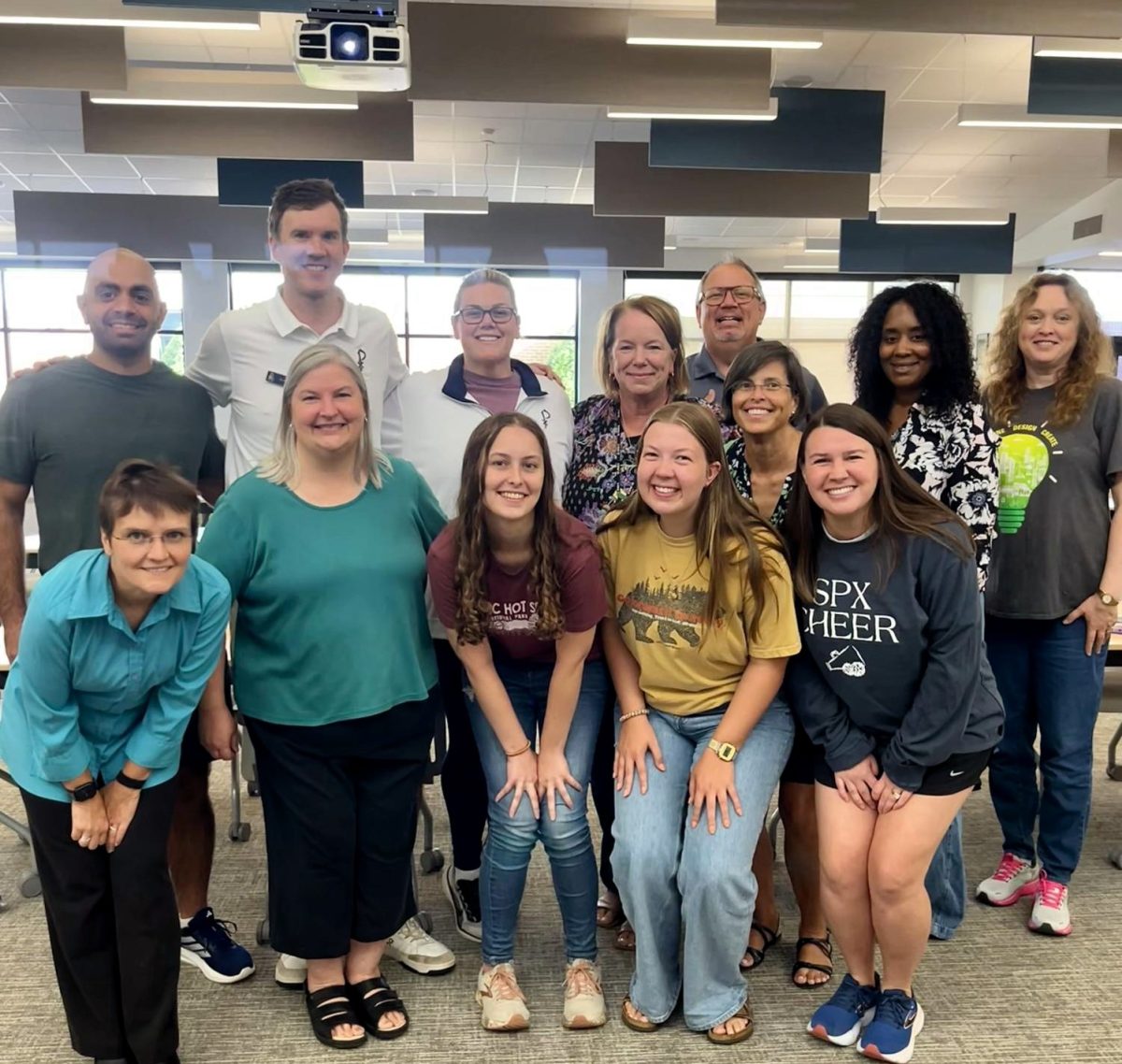 New teachers and staff get together for a photo during pre-planning in August.