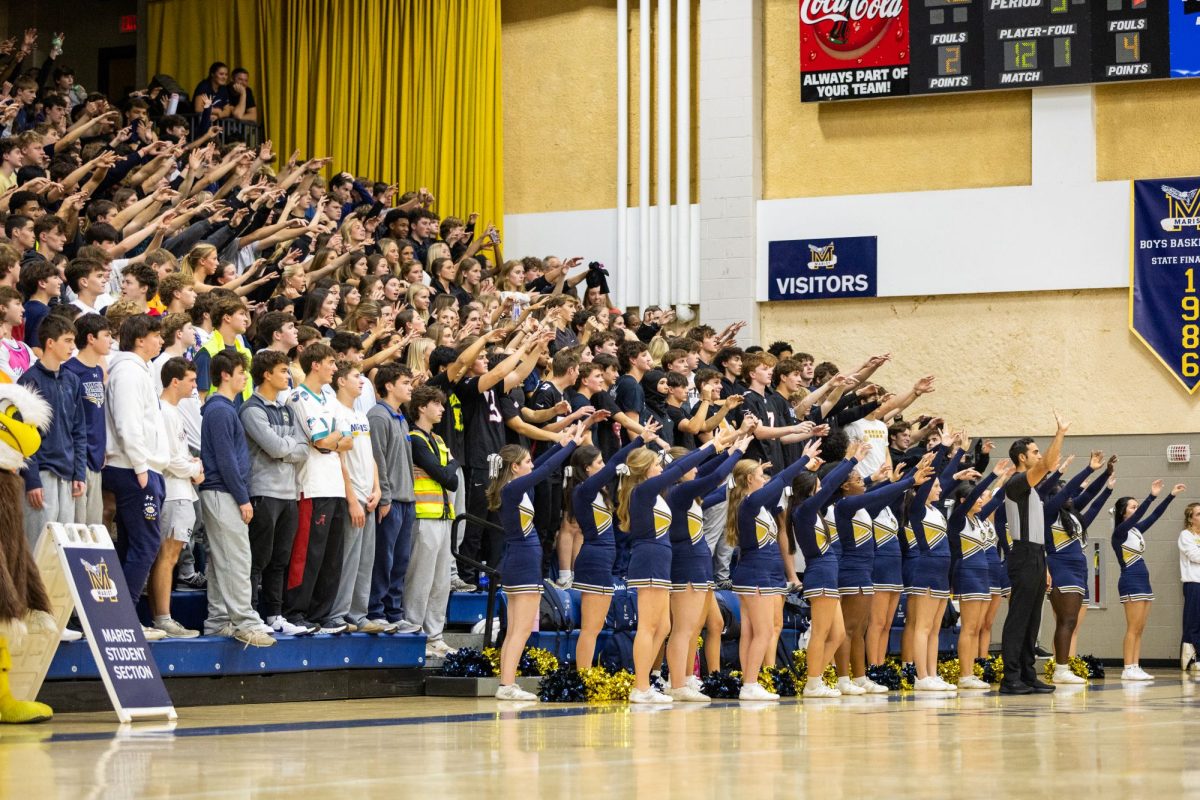 The Jungle cheers at an away basketball game against Marist. While Marist is the Golden Lions' longest and most heated rivalry, each sport features its own intense matchups every season.