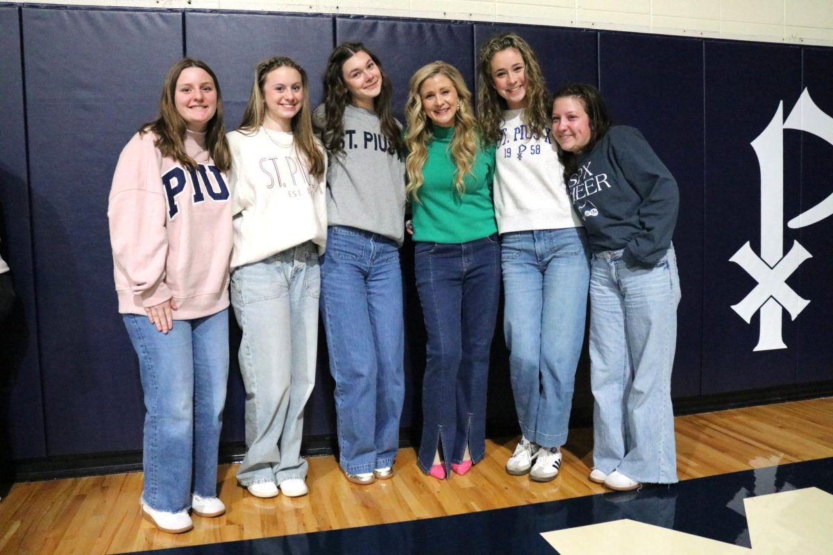 Students take a picture with Sarah Swafford after speaking to the student body in January. 