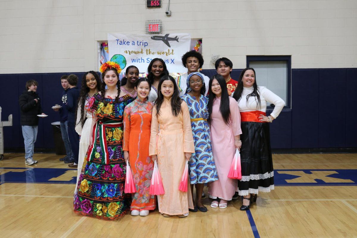Heritage Homecoming highlighted the diverse community at St. Pius X and included homemade dishes from students' native countries, live entertainment, games, raffle prizes, and an international fashion show 