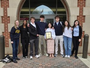 The Debate Team finished 2nd in the nation at the Woodward First Year National Championship in March.
Junior Anna Kallis took 1st place to win the Speaking National Title, and junior Clark Sanders was named 3rd best speaker. Senior team captains Ashlyn Loving and Sophia Darling helped prepare and lead the team to three of the top six spots at Nationals. Contributing members also included freshmen Rahwa Tsadwa and Annie Darling, and juniors Jack Willadsen and Alec Williams. Photo courtesy of Dr. Lauer
