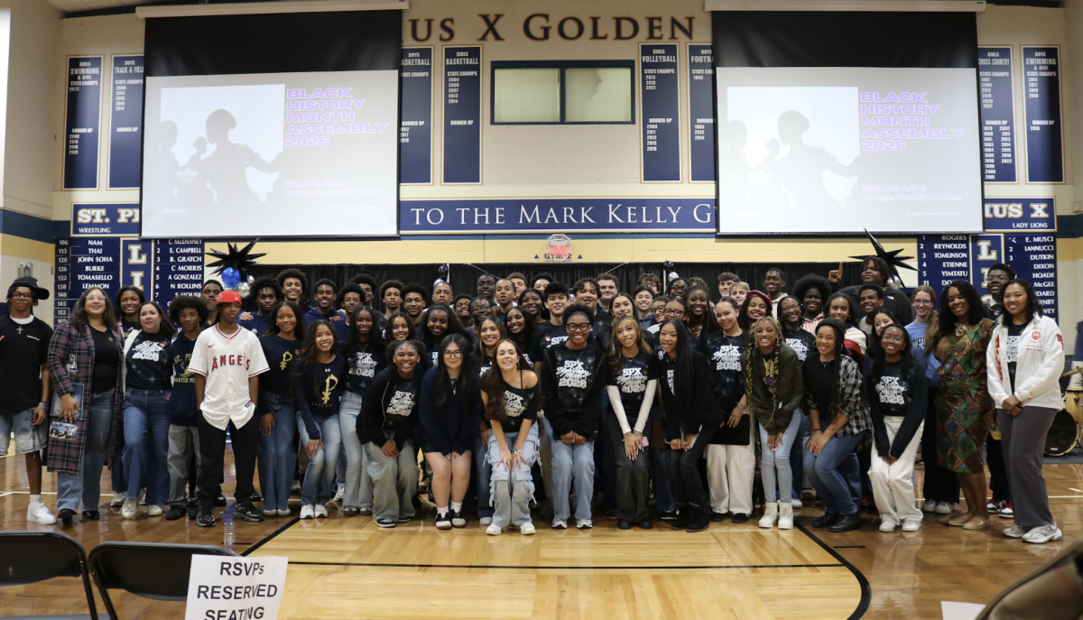 Memebers of the Diverse Student and all participants gathertfor a photo after another powerful and entertaining Black History Month Assembly.