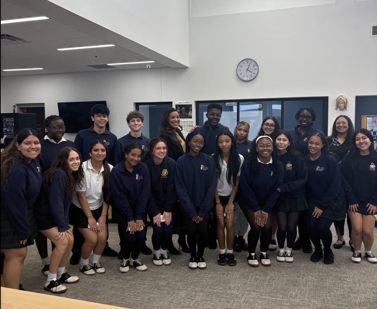 Members of the Diverse Student Union with Mrs. Jacqueline Howard. 